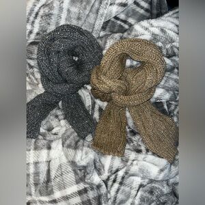 Gold metallic shimmering knit scarf.